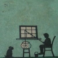 A boy fishing in a fish bowl